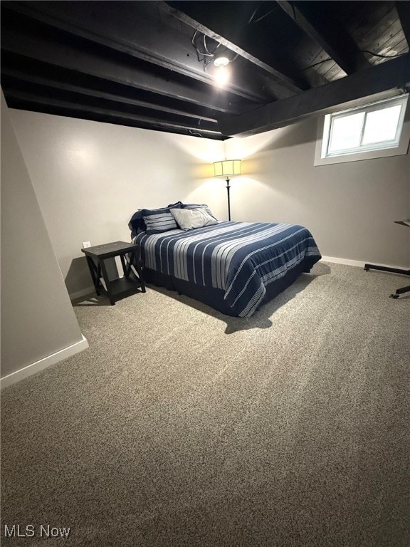 carpeted bedroom with baseboards