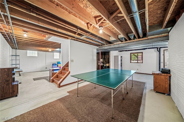 rec room with finished concrete flooring