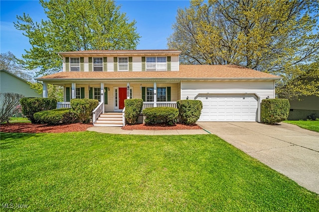 view of front facade featuring a porch, driveway, a front lawn, and a garage