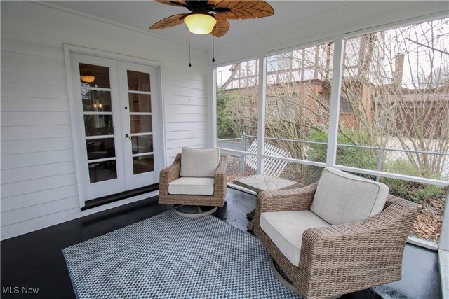 sunroom with french doors and ceiling fan