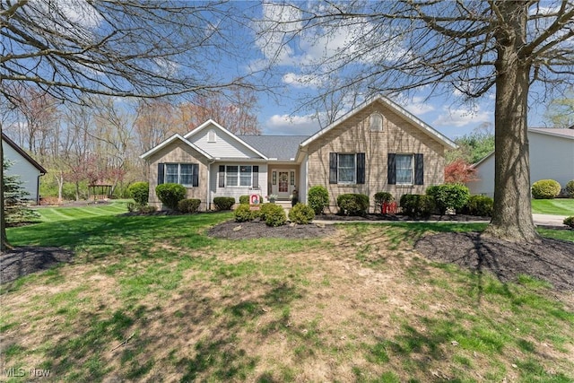 ranch-style home with a front yard