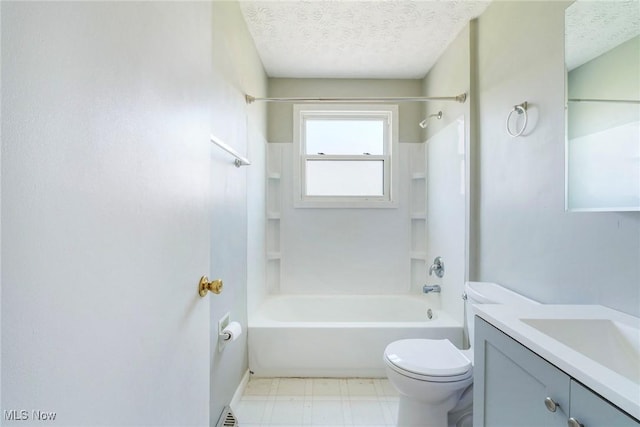 full bath with a textured ceiling, tile patterned floors, vanity, toilet, and washtub / shower combination