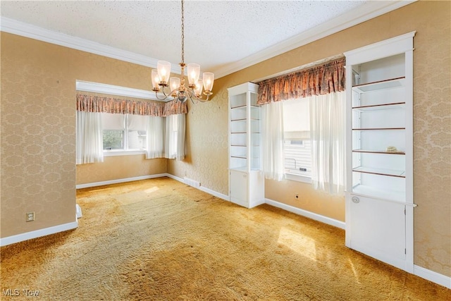 unfurnished dining area featuring a textured ceiling, baseboards, an inviting chandelier, ornamental molding, and carpet flooring
