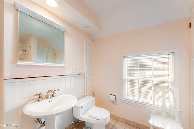 bathroom with tile patterned flooring, a sink, and toilet