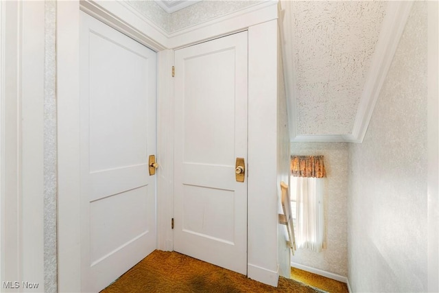 interior space featuring crown molding