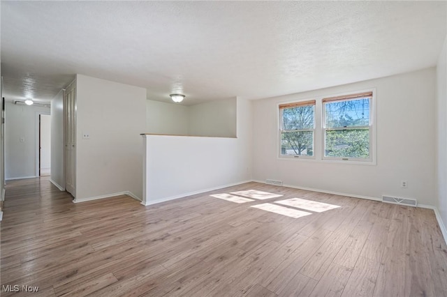 6414 Glenallen Ave, Solon, OH 44139 - spare room with wood finished floors and baseboards