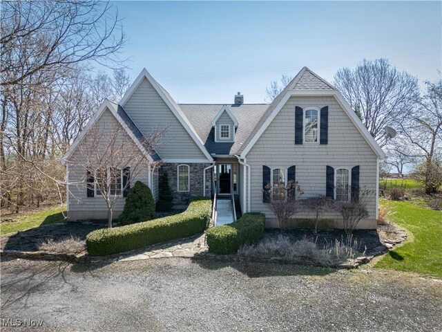 view of front of home with a chimney