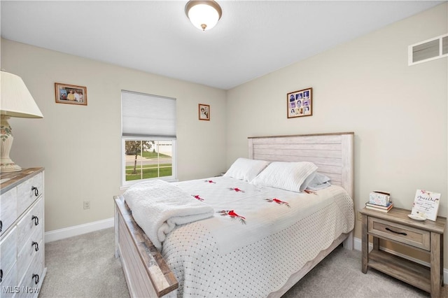 608 Chardonnay Cir, Vermilion, OH 44089 - bedroom featuring light colored carpet and baseboards