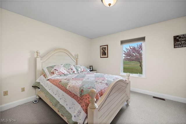 608 Chardonnay Cir, Vermilion, OH 44089 - carpeted bedroom with baseboards