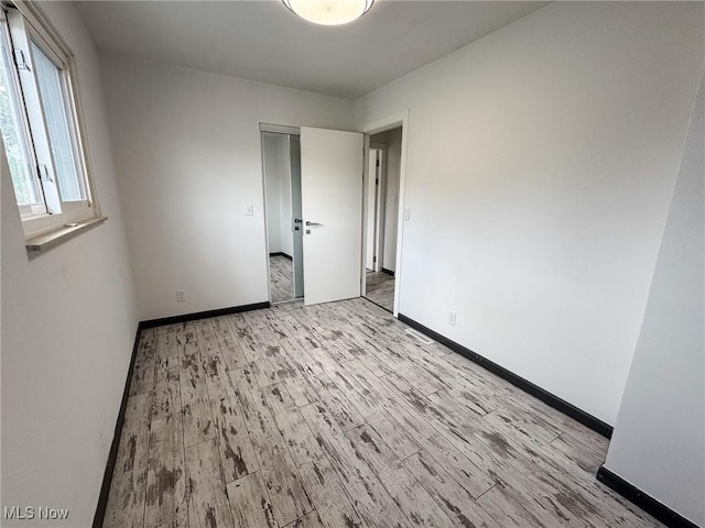 1160 Bethel Rd, Marietta, OH 45750 - spare room featuring baseboards and wood finished floors