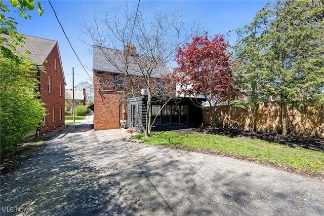 view of gate featuring fence