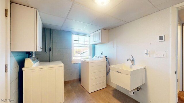 431 Somerset Dr, Chagrin Falls, OH 44022 - washroom with a sink, cabinet space, and washing machine and clothes dryer