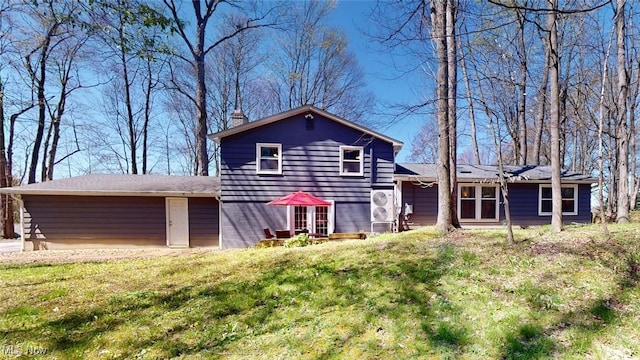 431 Somerset Dr, Chagrin Falls, OH 44022 - rear view of property with a lawn and a chimney