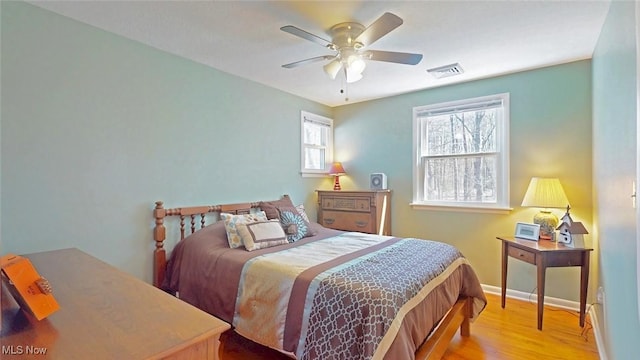 431 Somerset Dr, Chagrin Falls, OH 44022 - bedroom featuring ceiling fan, baseboards, visible vents, and wood finished floors