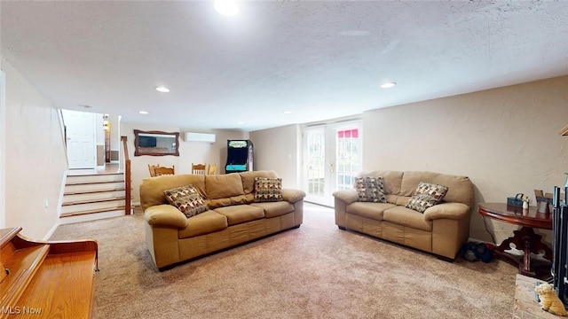 431 Somerset Dr, Chagrin Falls, OH 44022 - carpeted living room with stairway, a wall unit AC, recessed lighting, and a textured ceiling