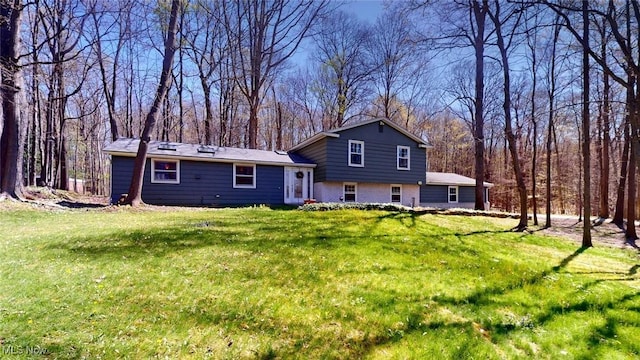 431 Somerset Dr, Chagrin Falls, OH 44022 - back of house featuring a yard