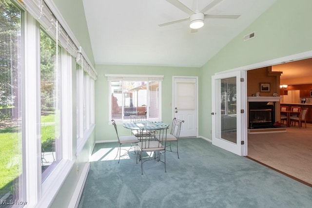 sunroom / solarium with visible vents and a healthy amount of sunlight
