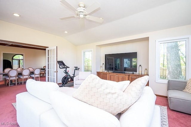 living room with a healthy amount of sunlight, carpet flooring, recessed lighting, and lofted ceiling