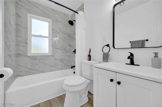 4392 E 144th St, Cleveland, OH 44128 - full bathroom with shower / bath combo with shower curtain, vanity, toilet, and wood finished floors