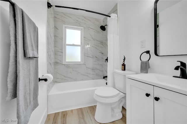 4392 E 144th St, Cleveland, OH 44128 - full bath with shower / bathtub combination with curtain, toilet, wood finished floors, and vanity