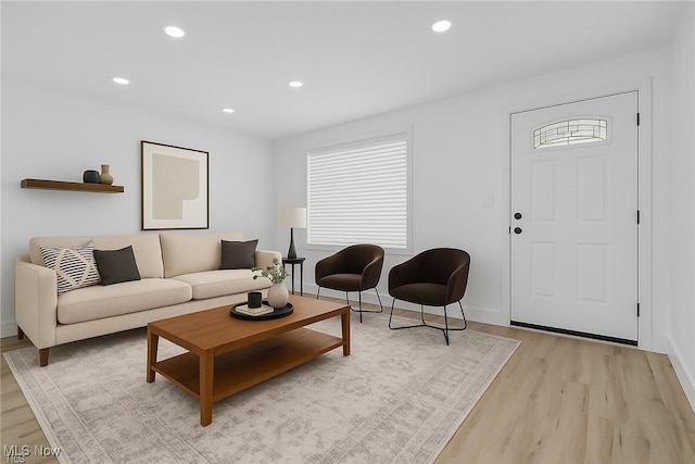 4392 E 144th St, Cleveland, OH 44128 - living area featuring light wood-style floors, baseboards, and recessed lighting