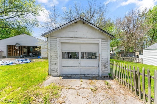 garage with fence