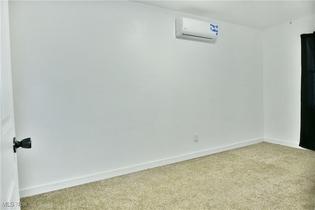 1553 Parkman Rd NW, Warren, OH 44485 - empty room with baseboards, a wall mounted air conditioner, and carpet flooring