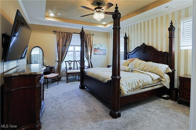 601 Cedar Crest Dr, Elyria, OH 44035 - bedroom featuring light colored carpet, a tray ceiling, crown molding, and recessed lighting