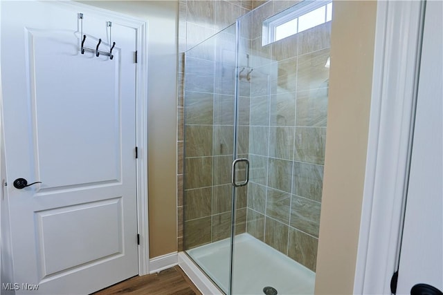 601 Cedar Crest Dr, Elyria, OH 44035 - full bath with a shower stall and wood finished floors