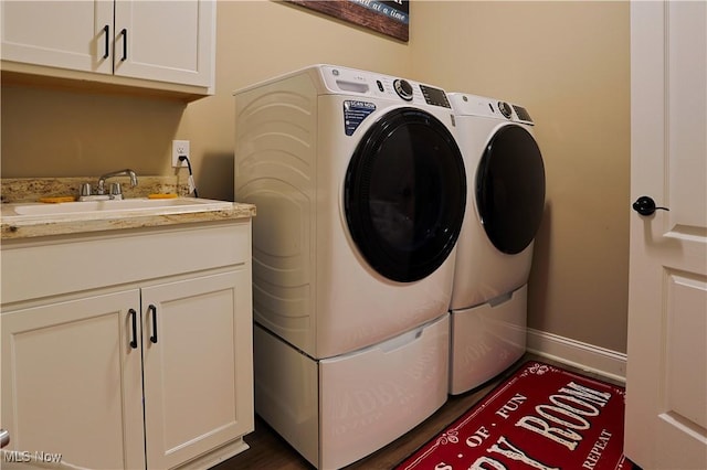 601 Cedar Crest Dr, Elyria, OH 44035 - laundry area with washer and dryer and cabinet space