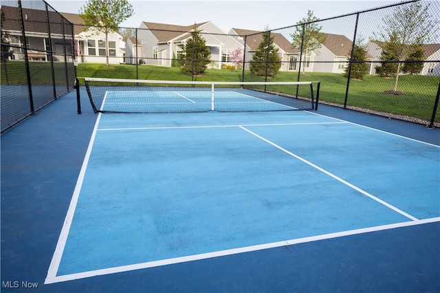 601 Cedar Crest Dr, Elyria, OH 44035 - view of tennis court featuring a residential view