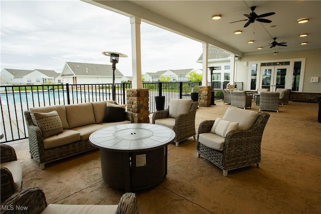 601 Cedar Crest Dr, Elyria, OH 44035 - view of patio with french doors, an outdoor living space, a community pool, and ceiling fan