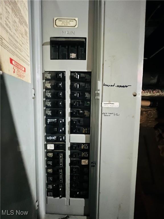 utility room featuring electric panel