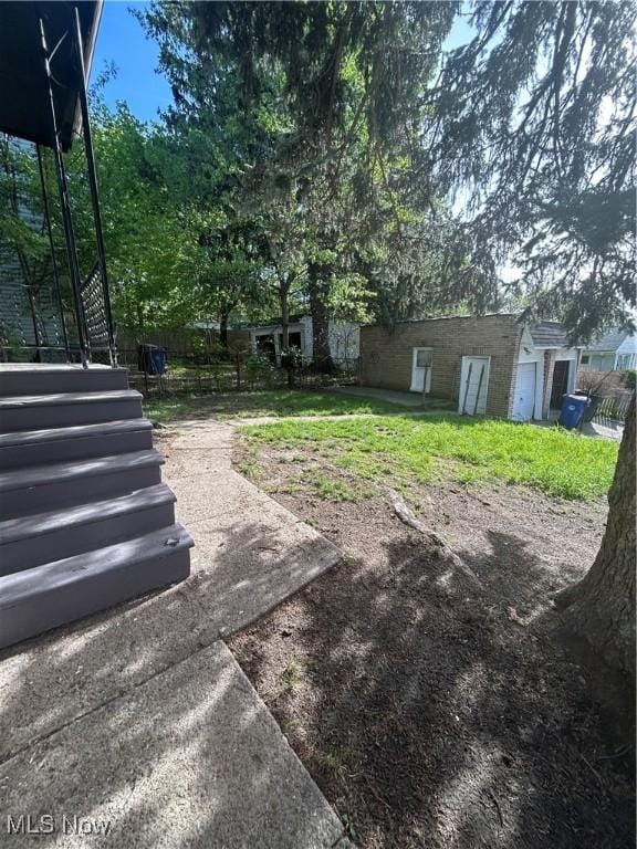 view of yard featuring stairway
