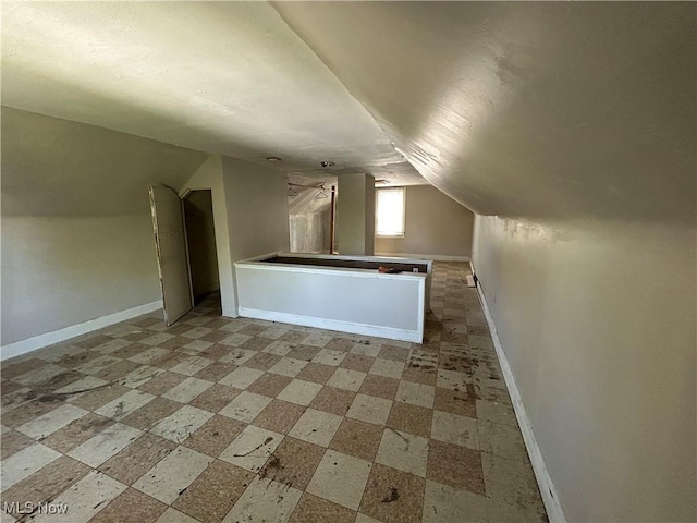3370 E 102nd St, Cleveland, OH 44104 - additional living space with vaulted ceiling and baseboards