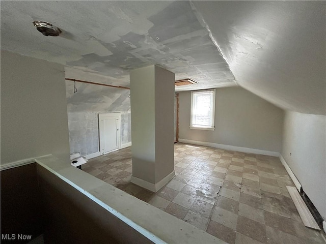 3370 E 102nd St, Cleveland, OH 44104 - additional living space with vaulted ceiling and baseboards