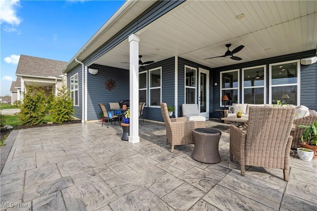 view of patio with ceiling fan and outdoor dining area