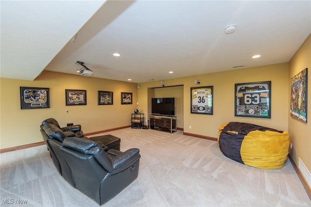living room with baseboards, carpet flooring, and recessed lighting