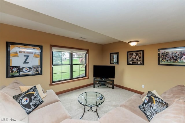 living room with carpet flooring and baseboards