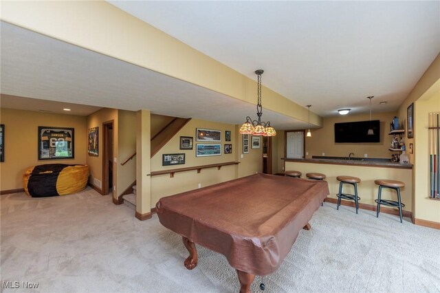 recreation room featuring carpet flooring, pool table, baseboards, and wet bar