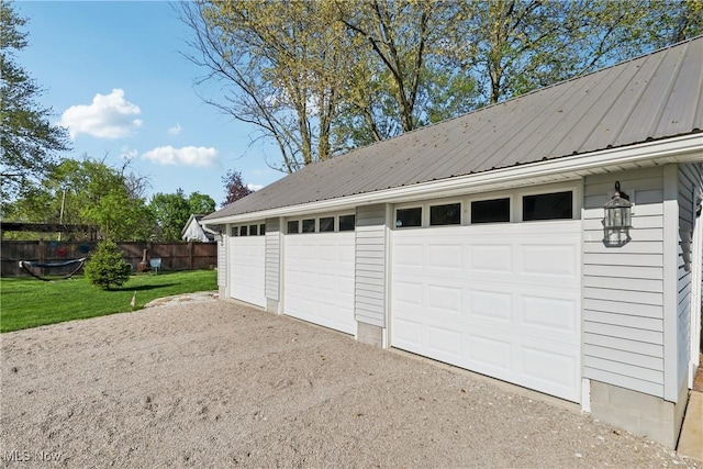 detached garage with fence