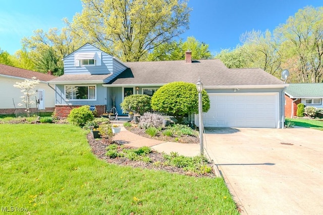 view of front of home featuring driveway, a chimney, a garage, brick siding, and a front lawn