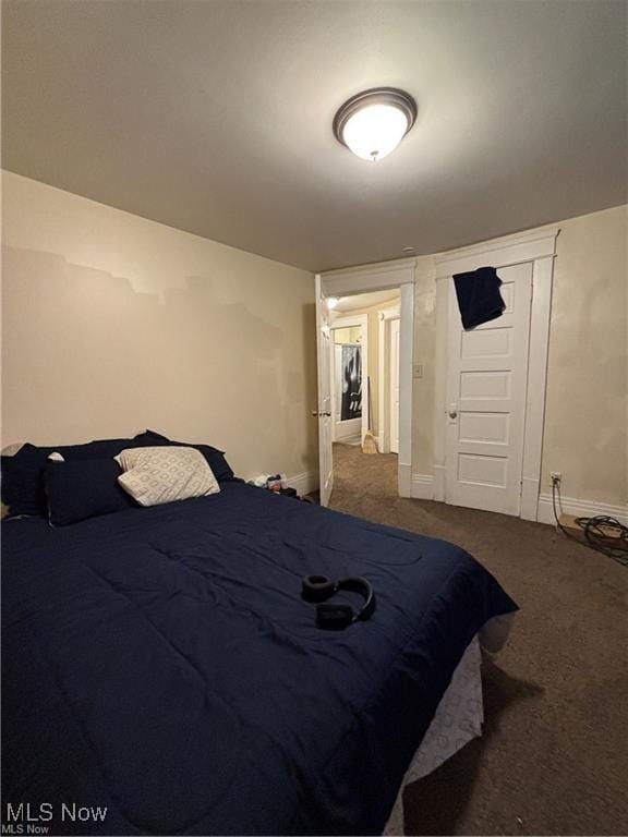 834 Kenyon St, Akron, OH 44311 - carpeted bedroom featuring baseboards