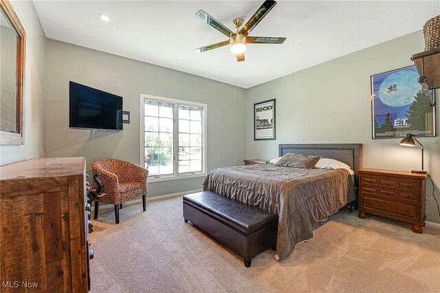 bedroom with carpet floors, baseboards, and ceiling fan