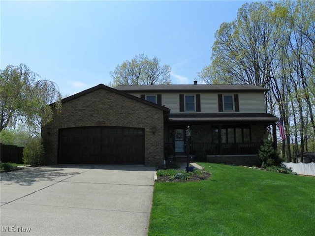 traditional-style house featuring an attached garage, a front lawn, brick siding, a porch, and concrete driveway