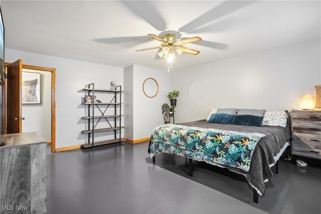 bedroom featuring baseboards and a ceiling fan