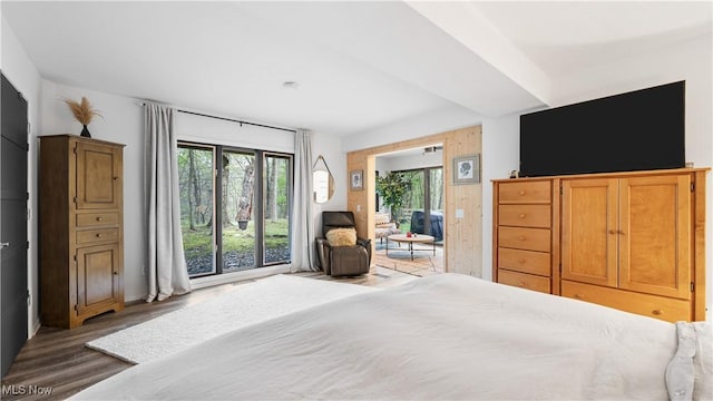bedroom featuring wood finished floors