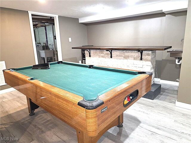 rec room featuring pool table, baseboards, a sink, and wood finished floors