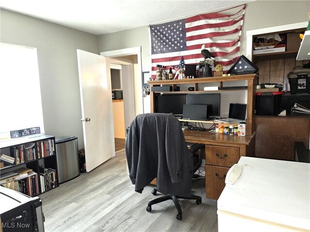 office area with wood finished floors