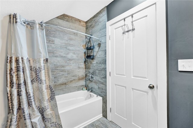full bath featuring shower / bathtub combination with curtain